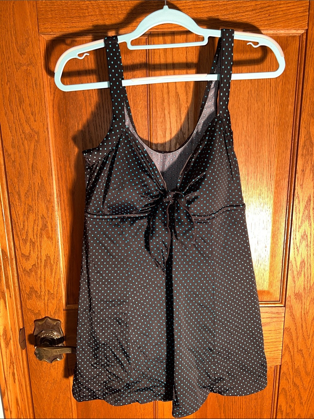 Black one piece swimsuit with Teal Polka Dots